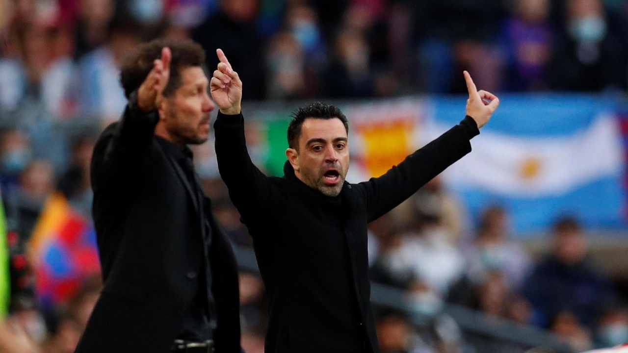 Xavi Hernandez e Diego Pablo Simeone